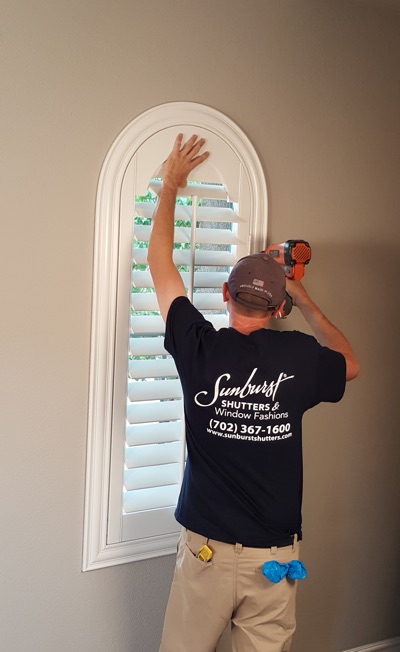 Shutter install in New York family room